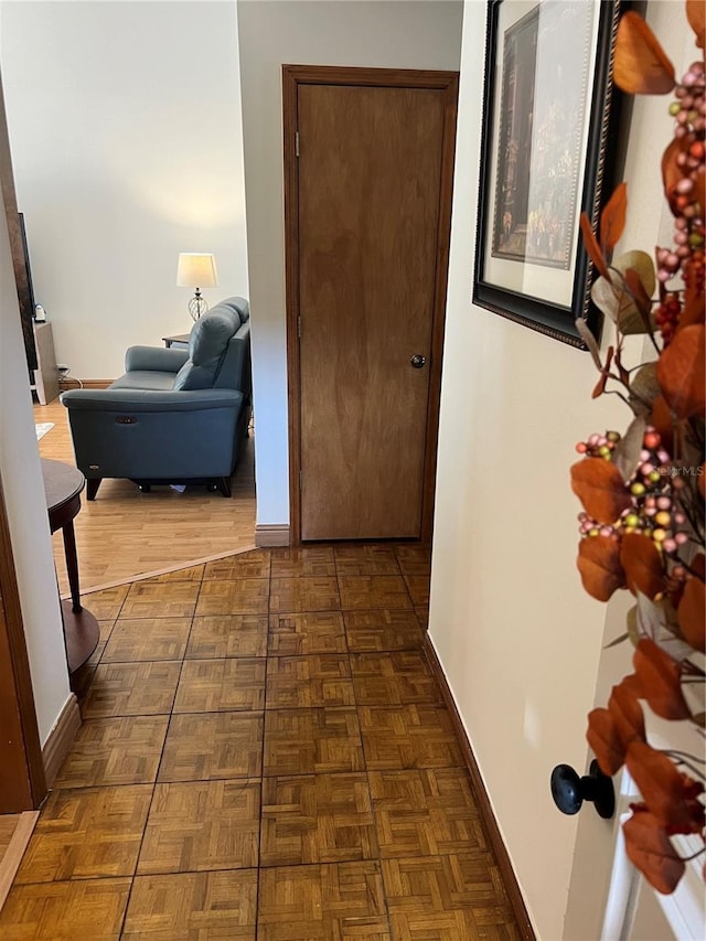 corridor with dark parquet floors