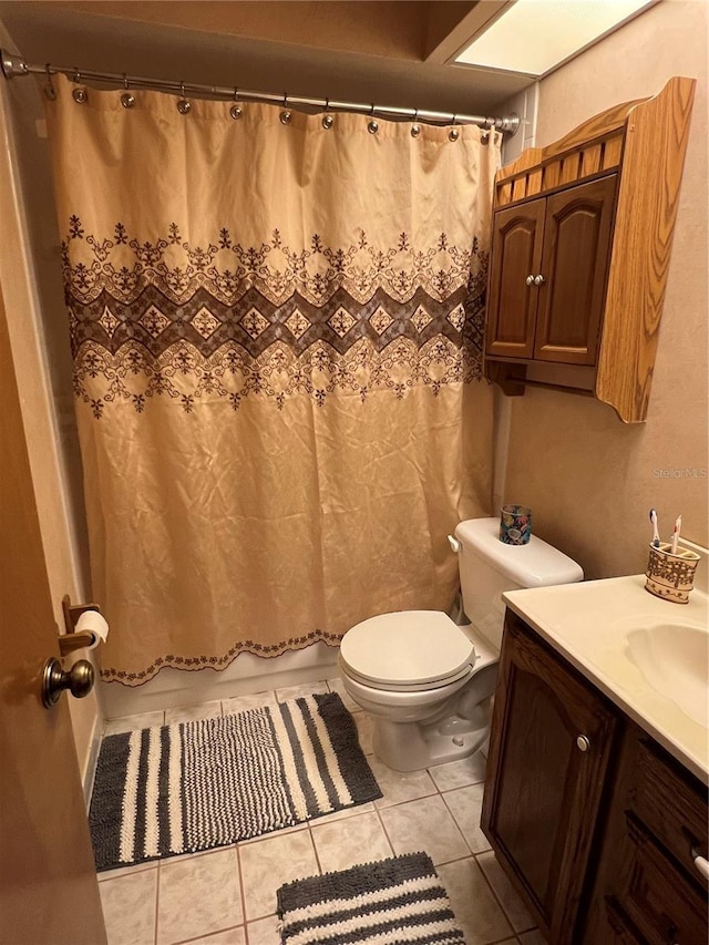 458 Windmeadows St, Altamonte Springs, FL 32701 - bathroom with toilet, tile patterned floors, vanity, and shower / tub combo with curtain