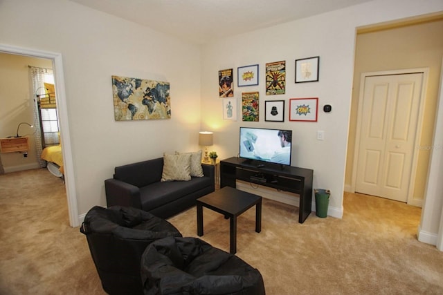 living room featuring light colored carpet