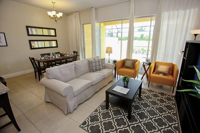 tiled living room with an inviting chandelier