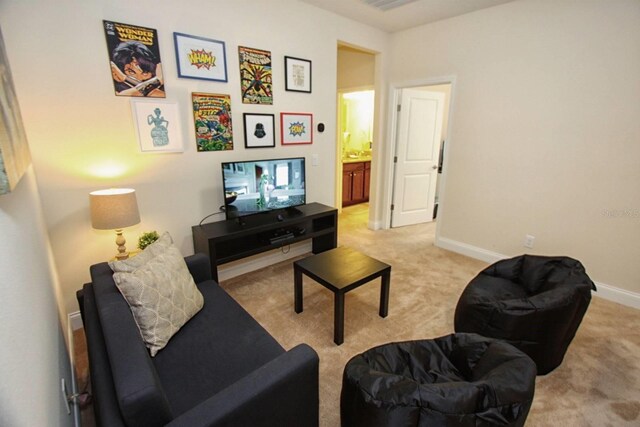 314 Captiva Dr, Davenport, FL 33896 - living room with carpet and baseboards