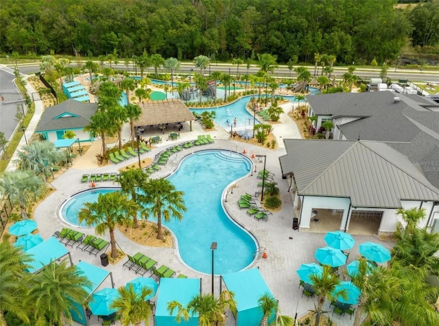 view of swimming pool with a patio