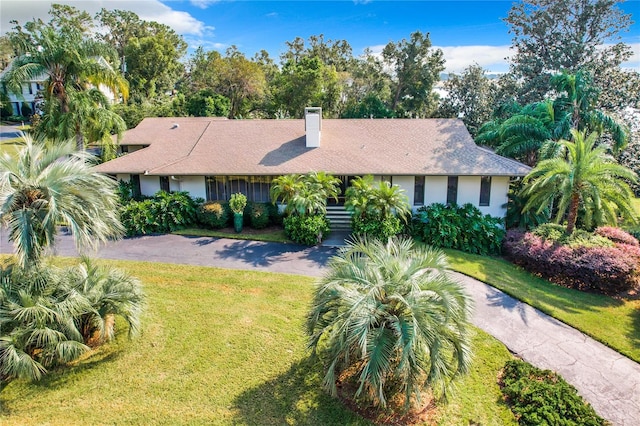 view of front of home with a front yard