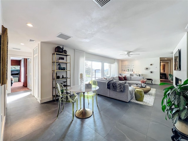 living room with ceiling fan