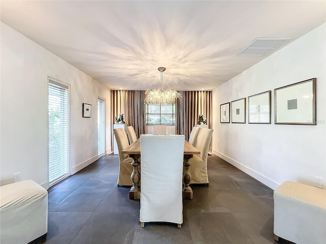 dining room with an inviting chandelier