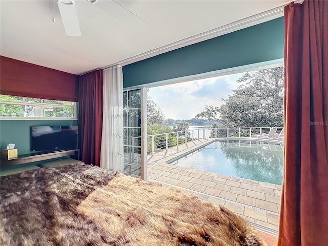 view of pool with ceiling fan