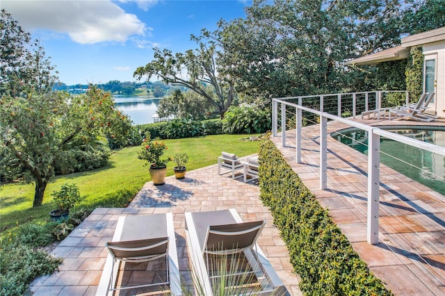 view of patio / terrace featuring a water view