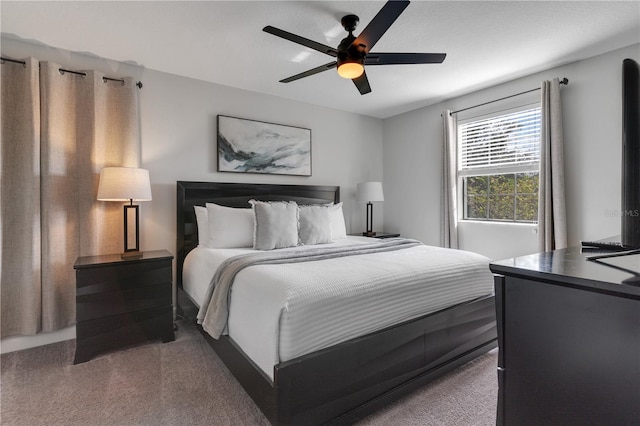 carpeted bedroom featuring ceiling fan