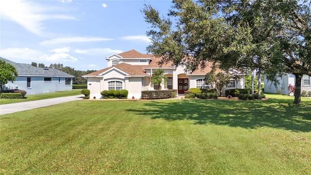 view of front of property with a front lawn