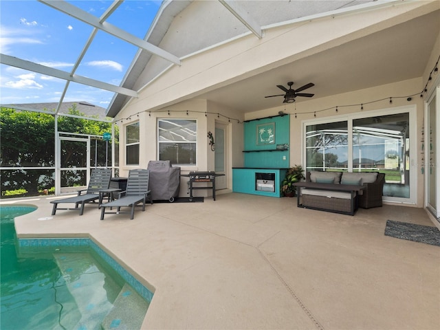 exterior space with lofted ceiling, a pool, and ceiling fan