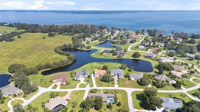 drone / aerial view with a water view