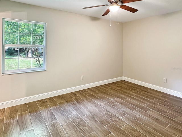 unfurnished room featuring ceiling fan and wood-type flooring