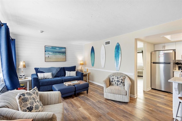 living room with hardwood / wood-style flooring