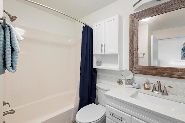 full bathroom featuring vanity, toilet, and shower / bathtub combination with curtain