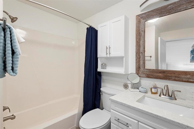 full bathroom featuring toilet, shower / bath combo with shower curtain, and vanity