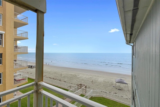 property view of water featuring a beach view