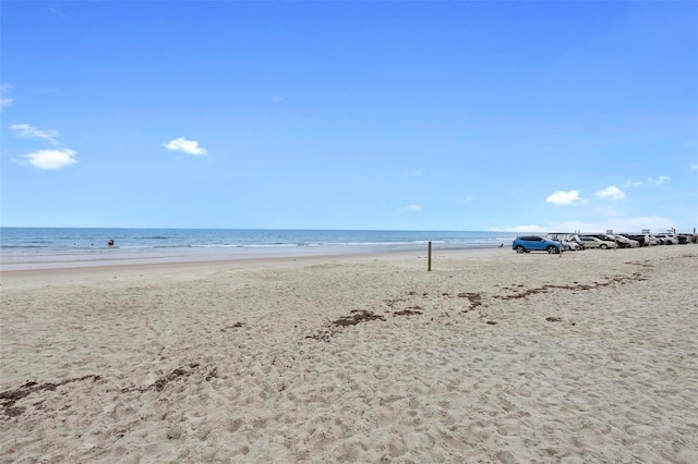property view of water featuring a beach view