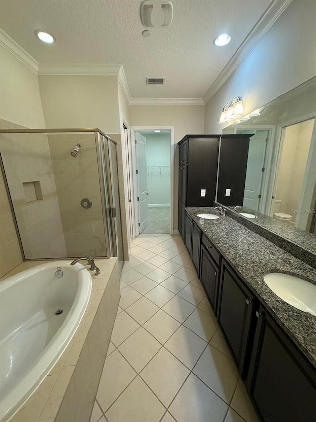 full bathroom featuring tile patterned floors, crown molding, plus walk in shower, and a textured ceiling