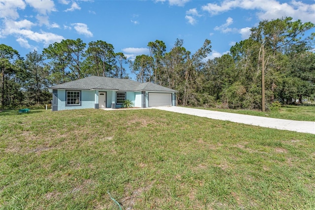 single story home with a front yard and a garage