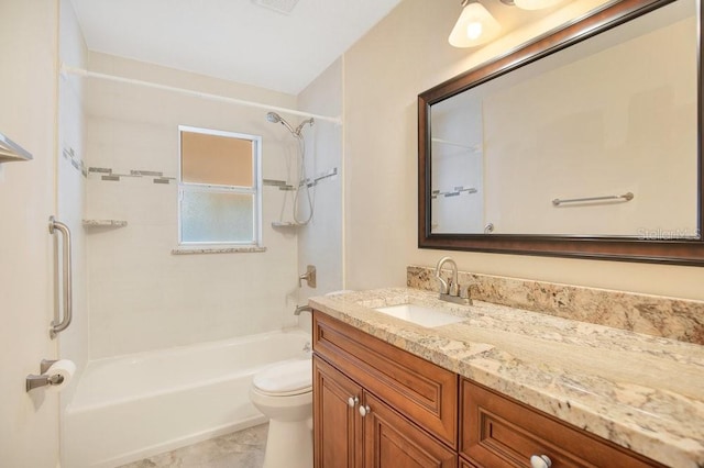 full bathroom with toilet, vanity, and shower / bath combination