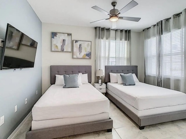 bedroom featuring ceiling fan