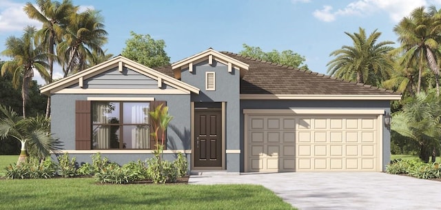 view of front of home with a front yard and a garage