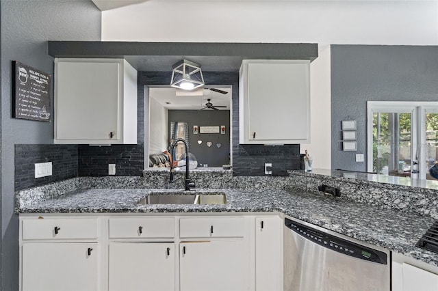 kitchen with sink, ceiling fan, stainless steel dishwasher, white cabinetry, and tasteful backsplash