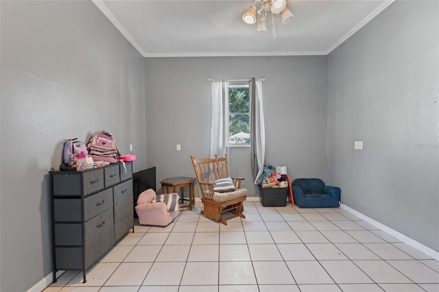 living area featuring ceiling fan, ornamental molding, and light tile patterned flooring