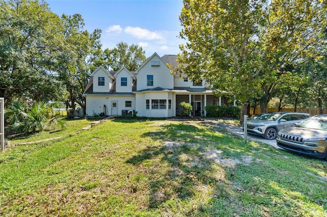 view of front facade with a front yard