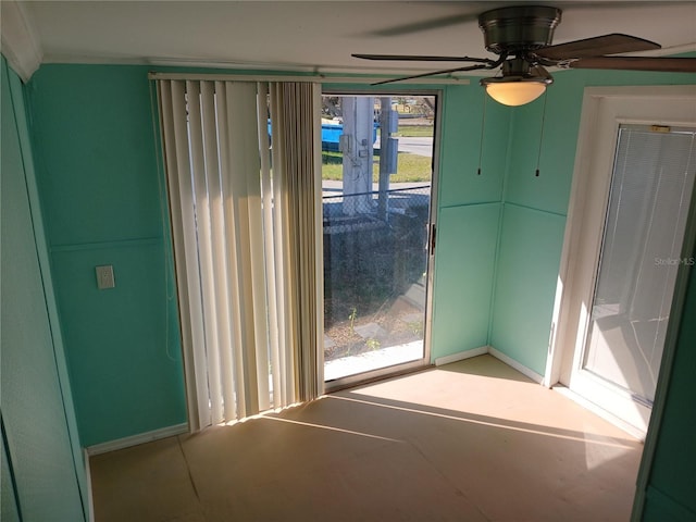 entryway with ceiling fan and light tile patterned floors