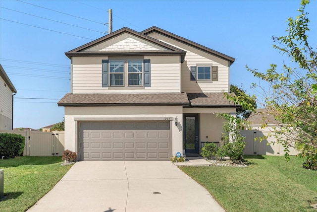 view of front facade featuring a front yard and a garage