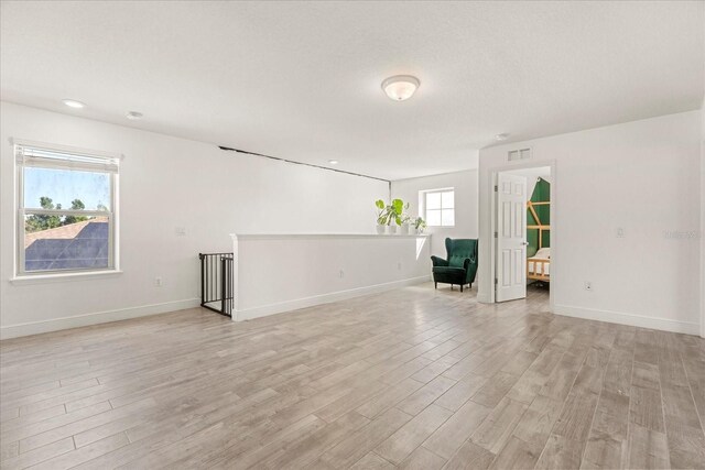 1909 Cayman Cove Cir, Saint Cloud, FL 34772 - unfurnished room with baseboards and light wood finished floors