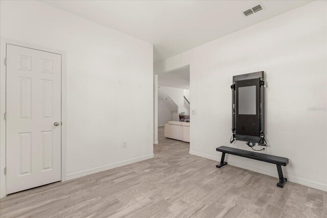 1909 Cayman Cove Cir, Saint Cloud, FL 34772 - interior space with light wood-style flooring, visible vents, and baseboards