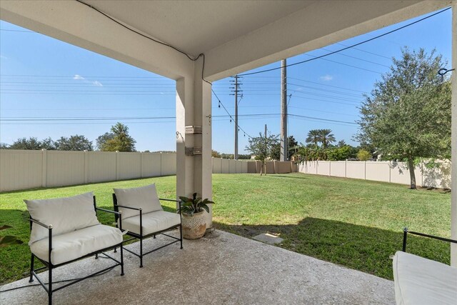 1909 Cayman Cove Cir, Saint Cloud, FL 34772 - view of yard featuring a fenced backyard and a patio