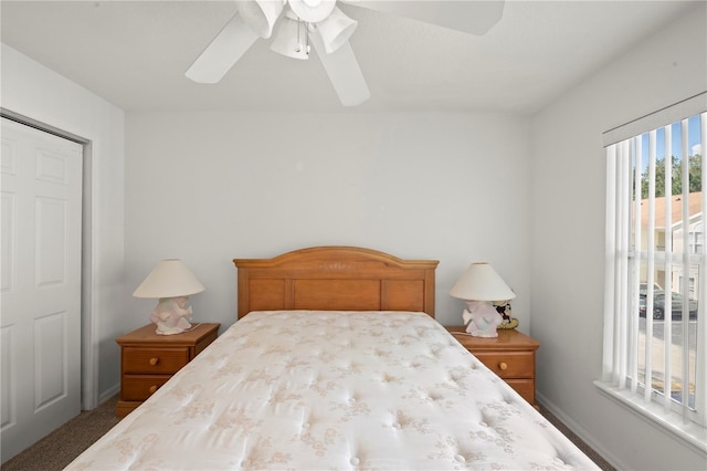 carpeted bedroom with ceiling fan