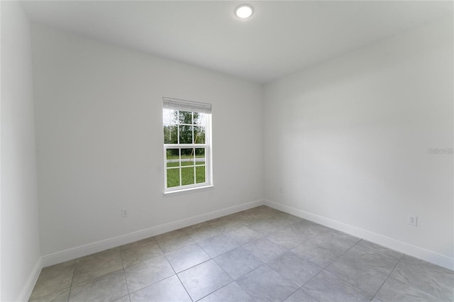 view of tiled spare room