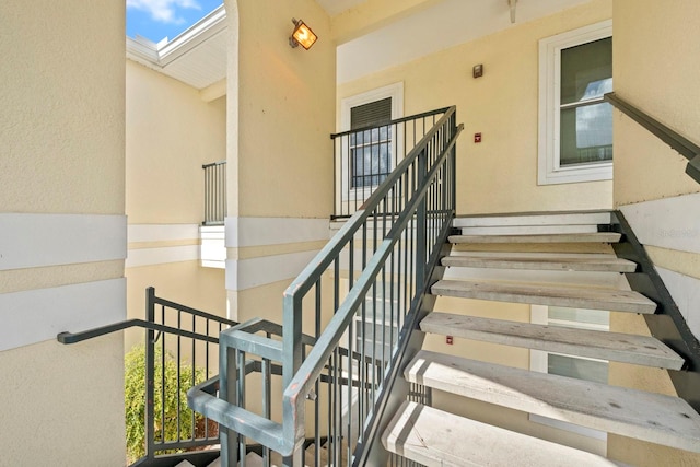 stairway with a skylight