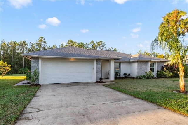 ranch-style house with a front lawn and a garage