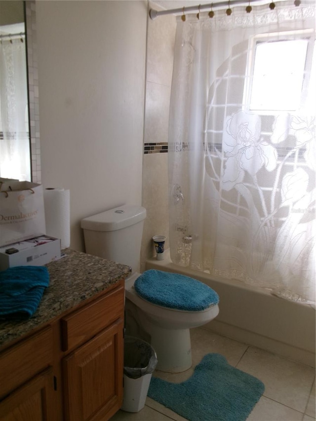 2618 Coventry Ln, Ocoee, FL 34761 - full bathroom with vanity, shower / tub combo with curtain, and tile patterned floors