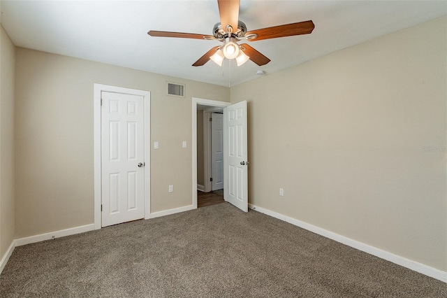 unfurnished bedroom with carpet flooring and ceiling fan