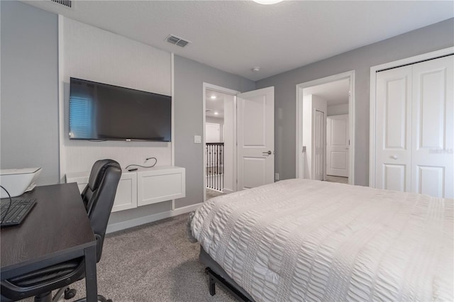 bedroom with carpet flooring and a closet