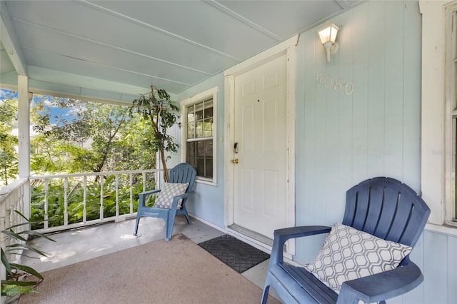5080 Seminole Ave, Winter Park, FL 32792 - view of exterior entry featuring a porch