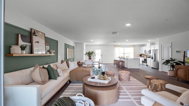 living room with hardwood / wood-style flooring