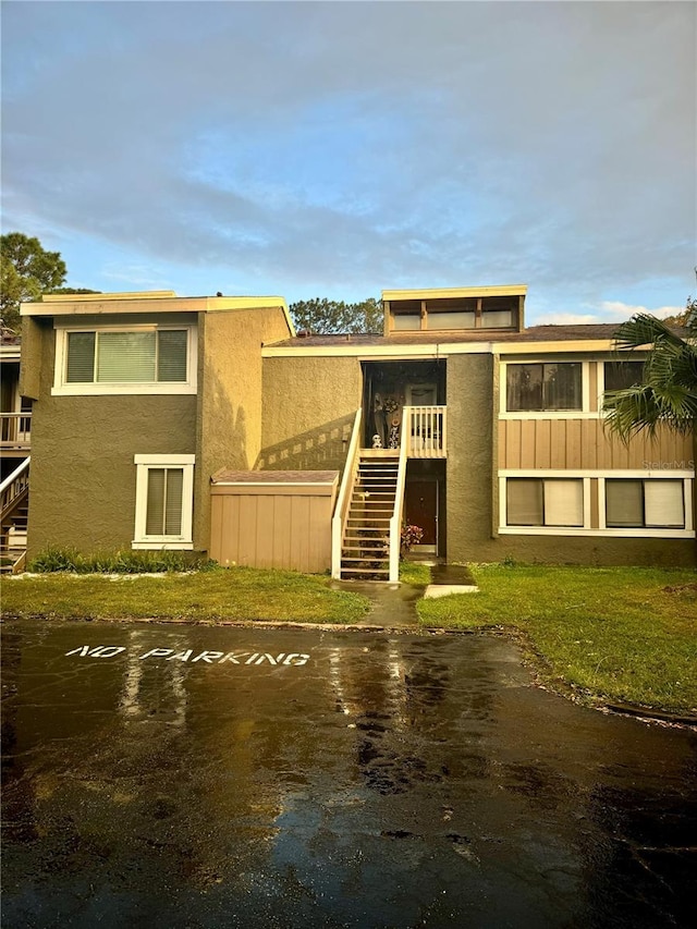 exterior space with a front lawn