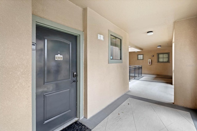 doorway to property with a balcony