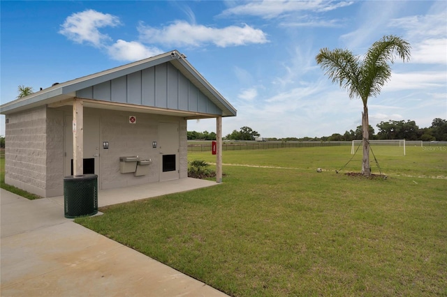 view of yard featuring a rural view and a patio area