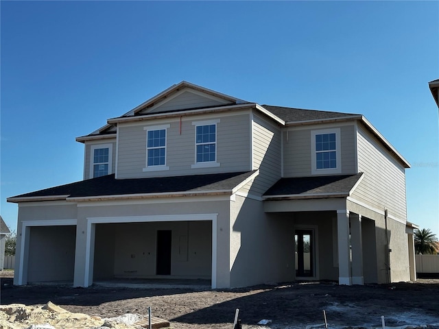 view of front of property featuring a garage