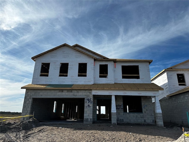 property in mid-construction featuring a garage