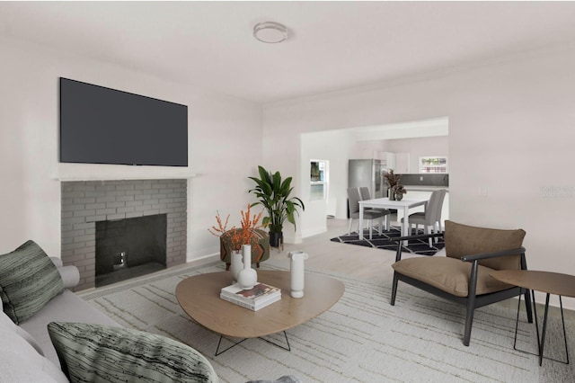 living room featuring a fireplace and light colored carpet