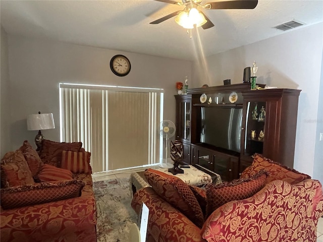 living room featuring ceiling fan